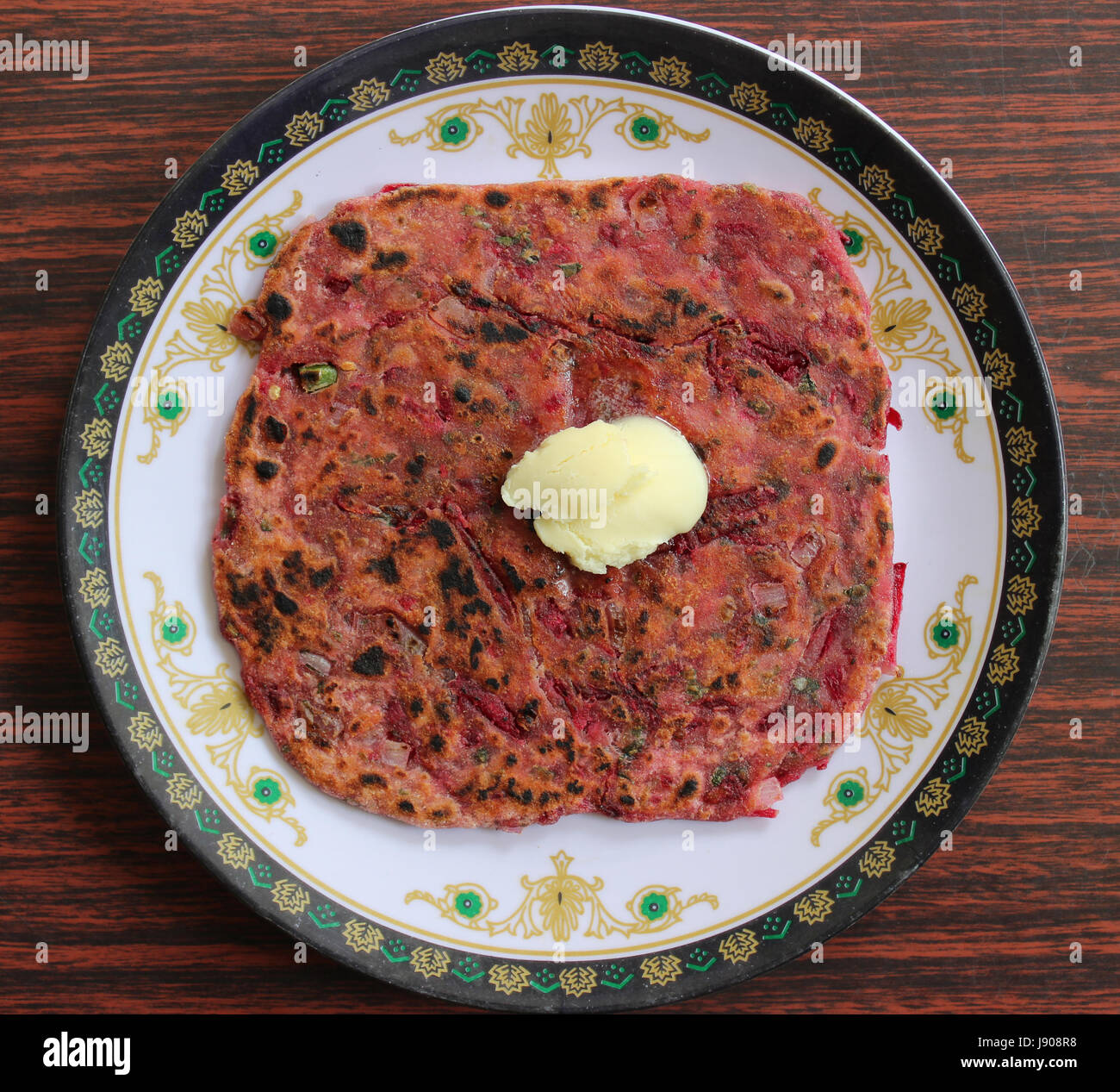 Beetroot paratha and pasteurized butter Stock Photo Alamy
