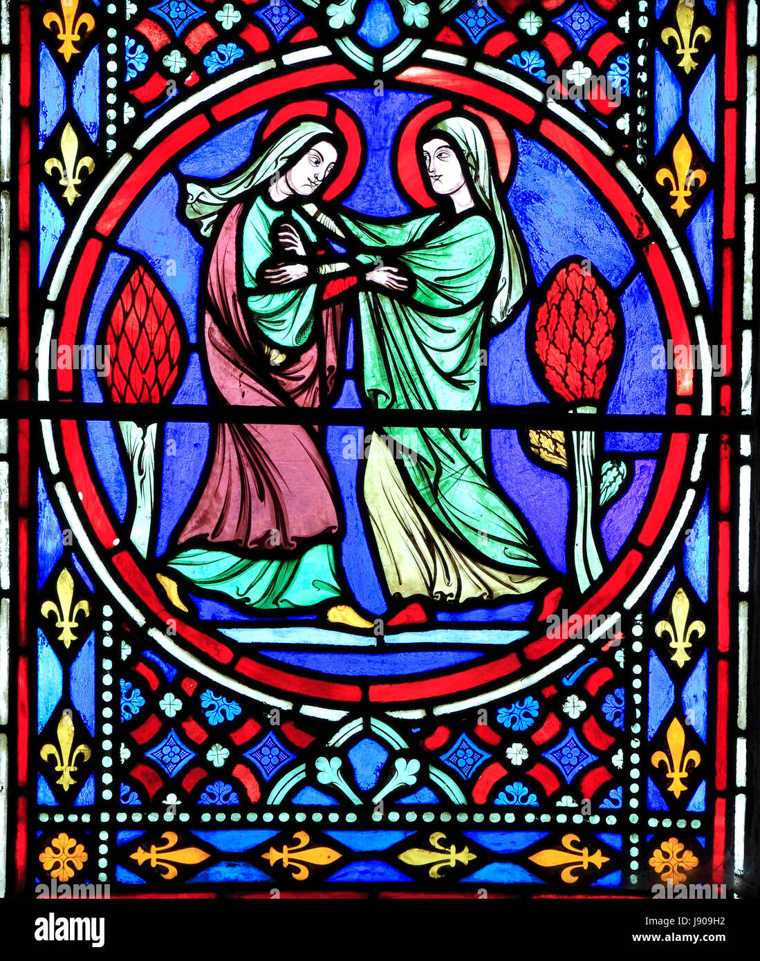 Nativity Window, stained glass by Oudinot of Paris, 1861, Feltwell Church, Norfolk, Visit of Virgin Mary to her cousin Elizabeth, visitation Stock Photo