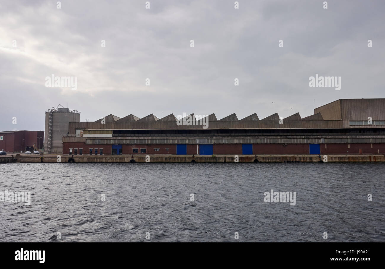 Town of Dunquerke, Normandy, France: port authority area with docks and warehouses where several kinds of raw materials are stored Stock Photo