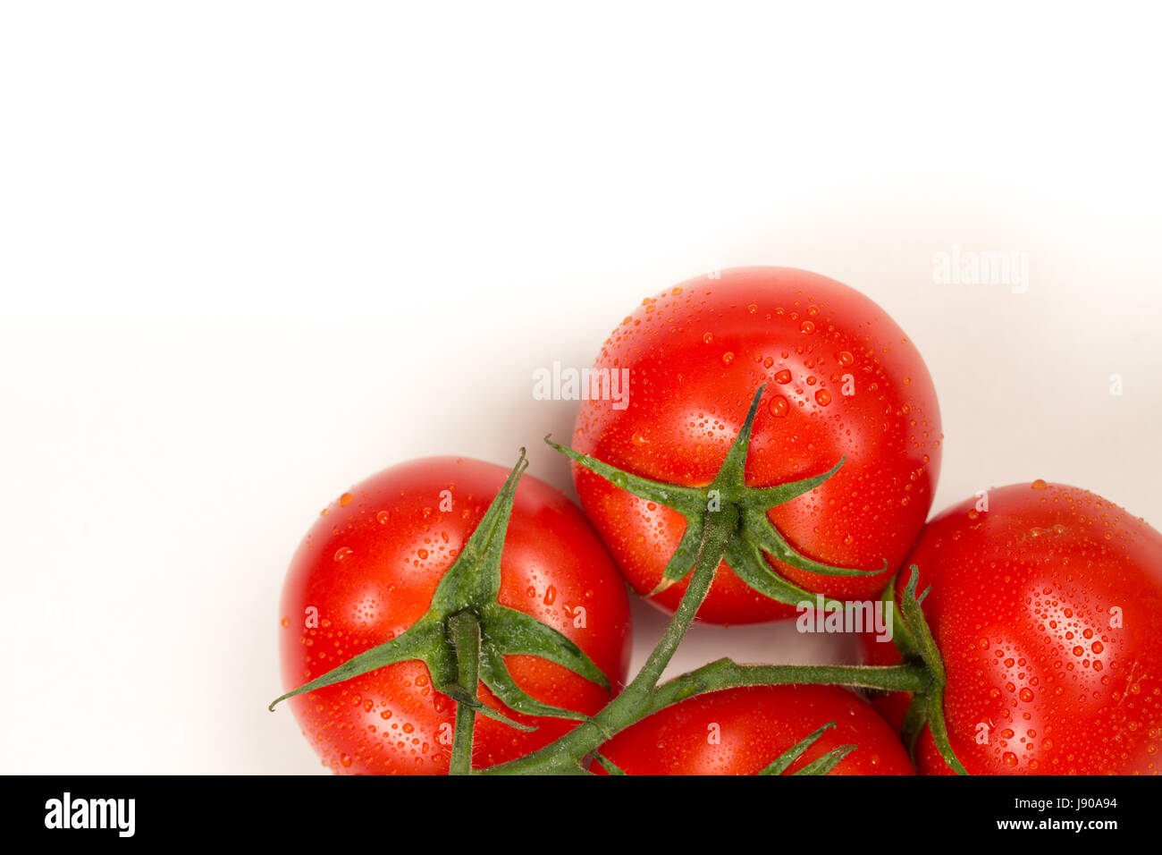 Red fresh tomatoes isolated on white background Stock Photo