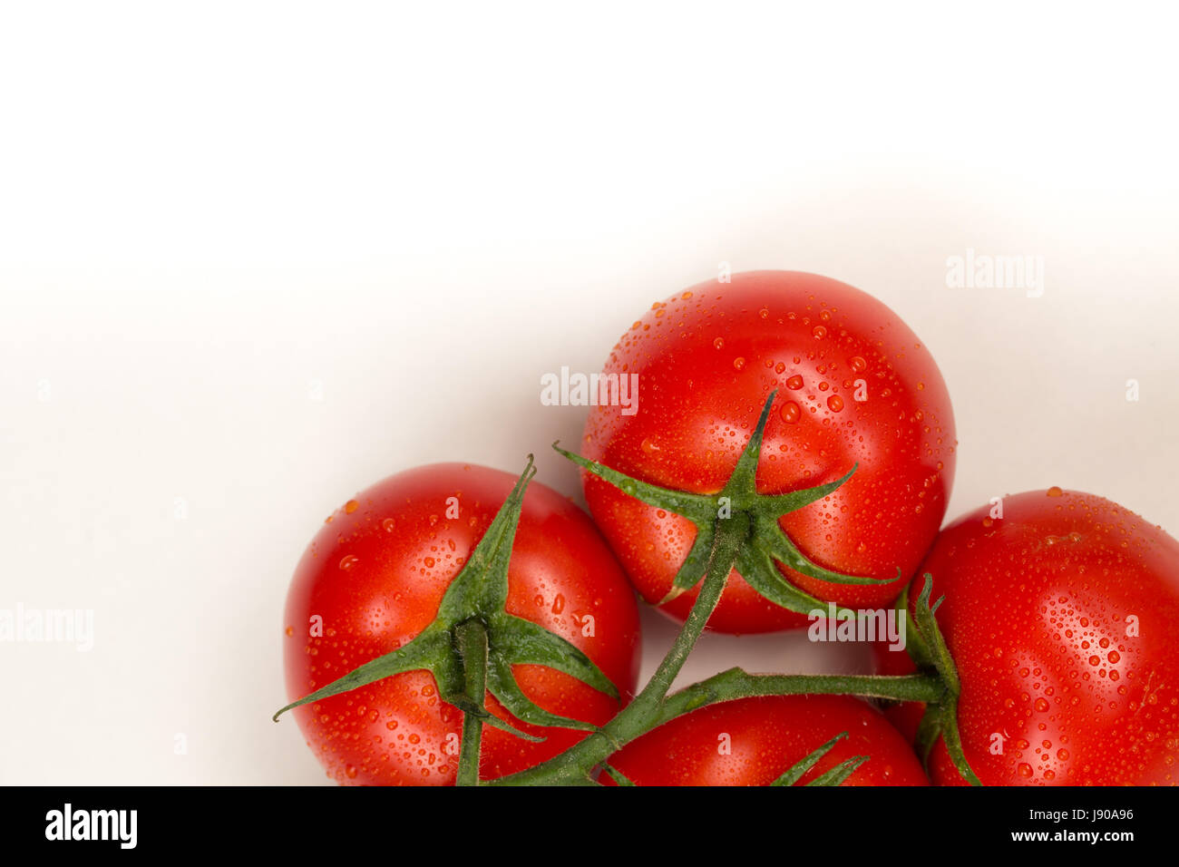 Red fresh tomatoes isolated on white background Stock Photo