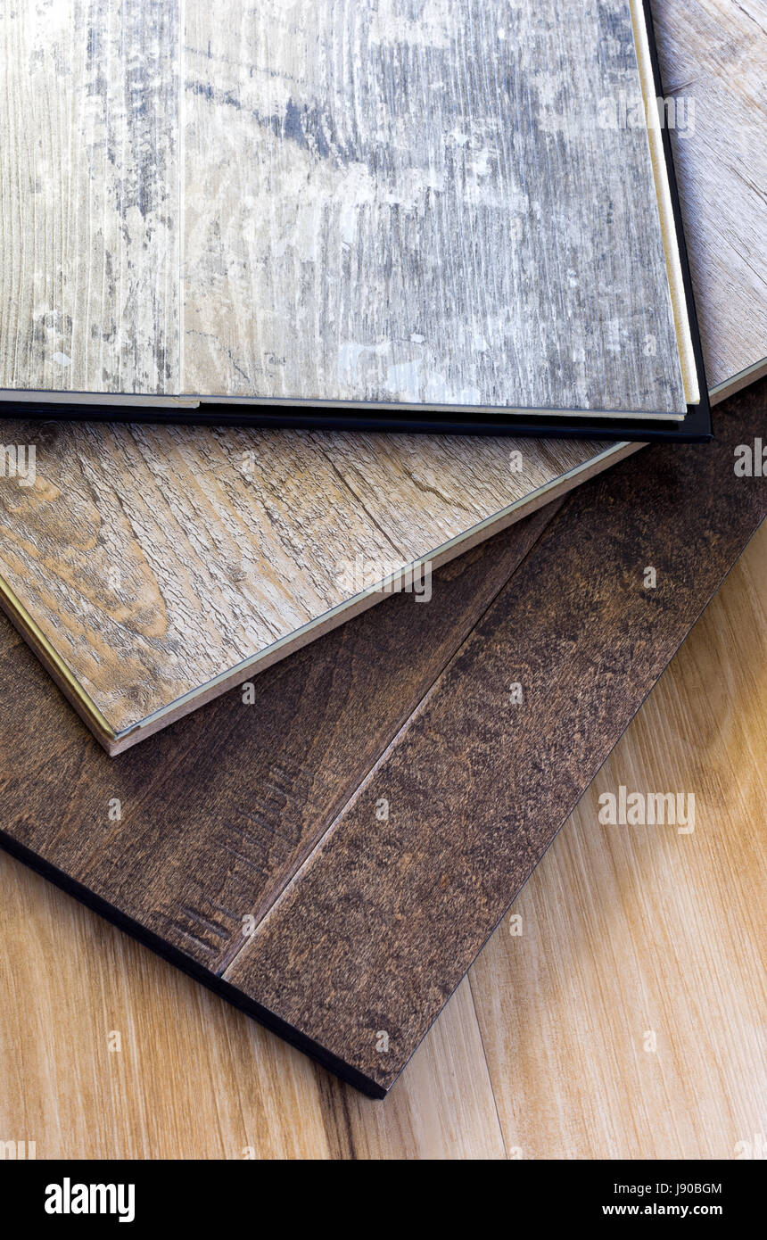 engineered tongue in groove hardwood and vinyl floor planks of various