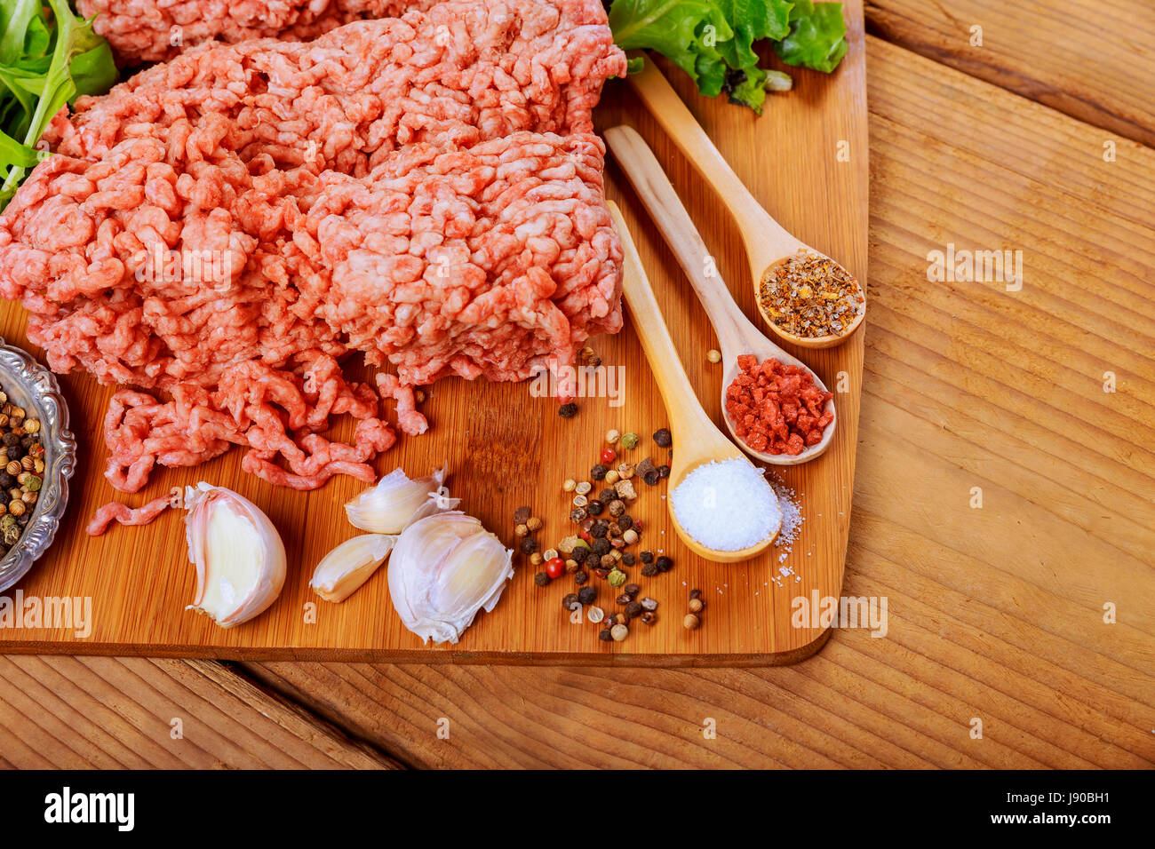 minced beef, onion, garlic black pepper ready for cooking Stock Photo