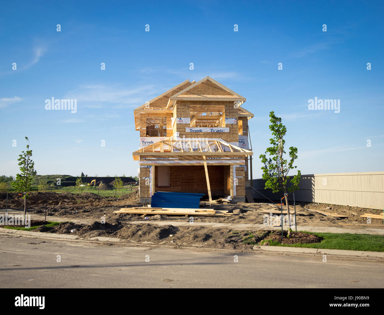 A two-storey residential house under construction in the Edmonton suburb of Beaumont, Alberta, Canada. Stock Photo