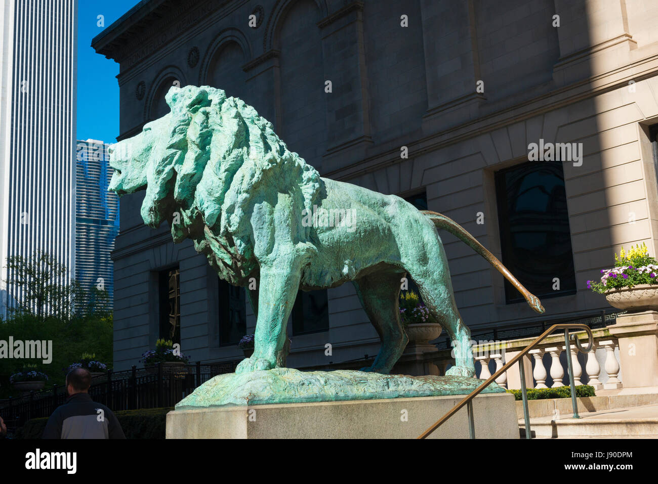 Chicago Illinois Michigan Avenue The Art Institute of Chicago detail main entrance statue sculpture art bronze lion by Edward Kemeys 1893 On the Prowl Stock Photo