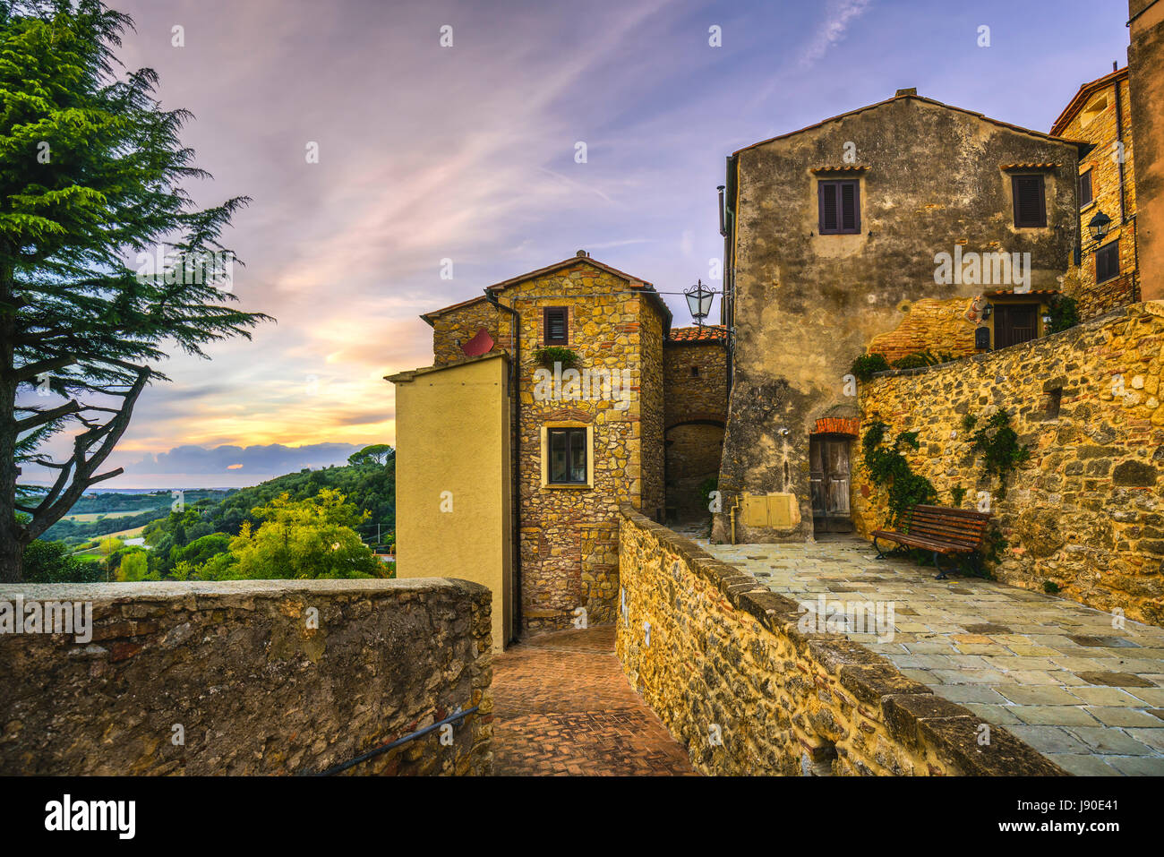 Casale Marittimo old stone village in Maremma on sunset. Picturesque street and traditional houses. Tuscany, Italy Europe. Stock Photo