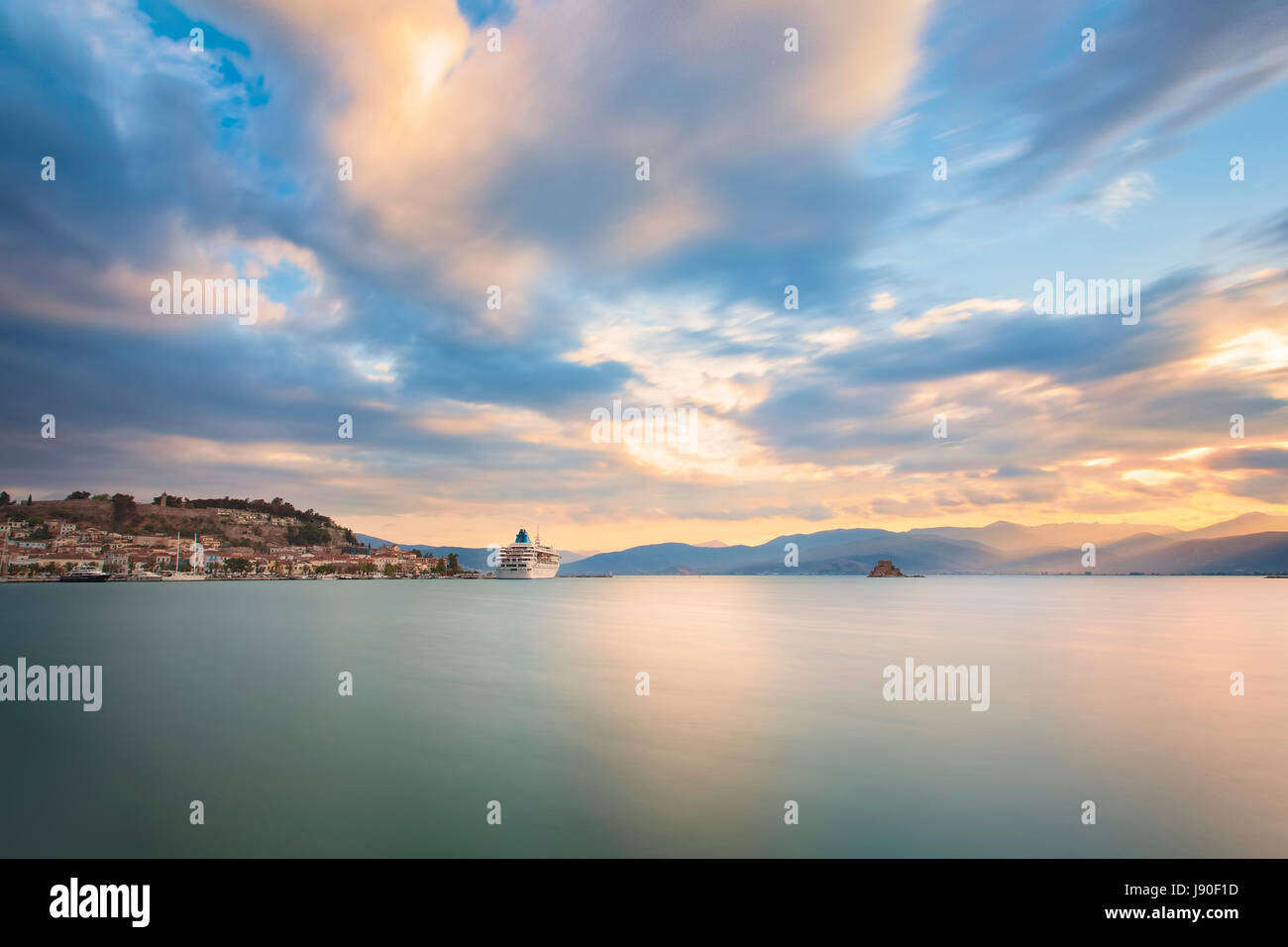 Cruise ship on dock at night Stock Photo - Alamy