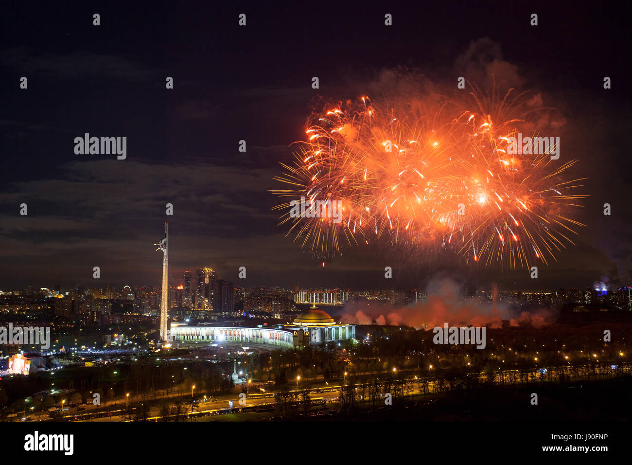 Bright fireworks explosions in night sky in Moscow, Russia Stock Photo