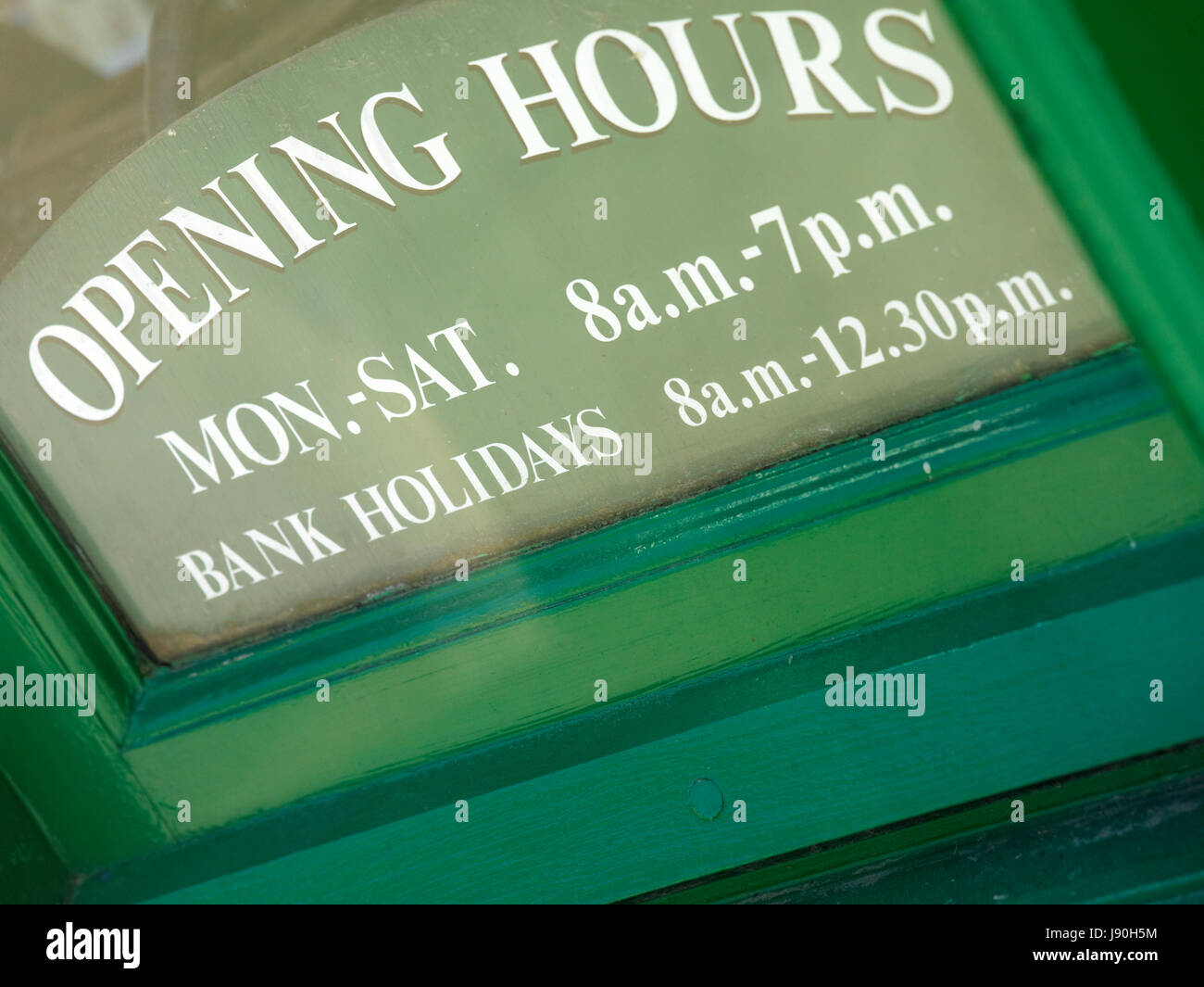 Opening hours sign board Stock Photo Alamy