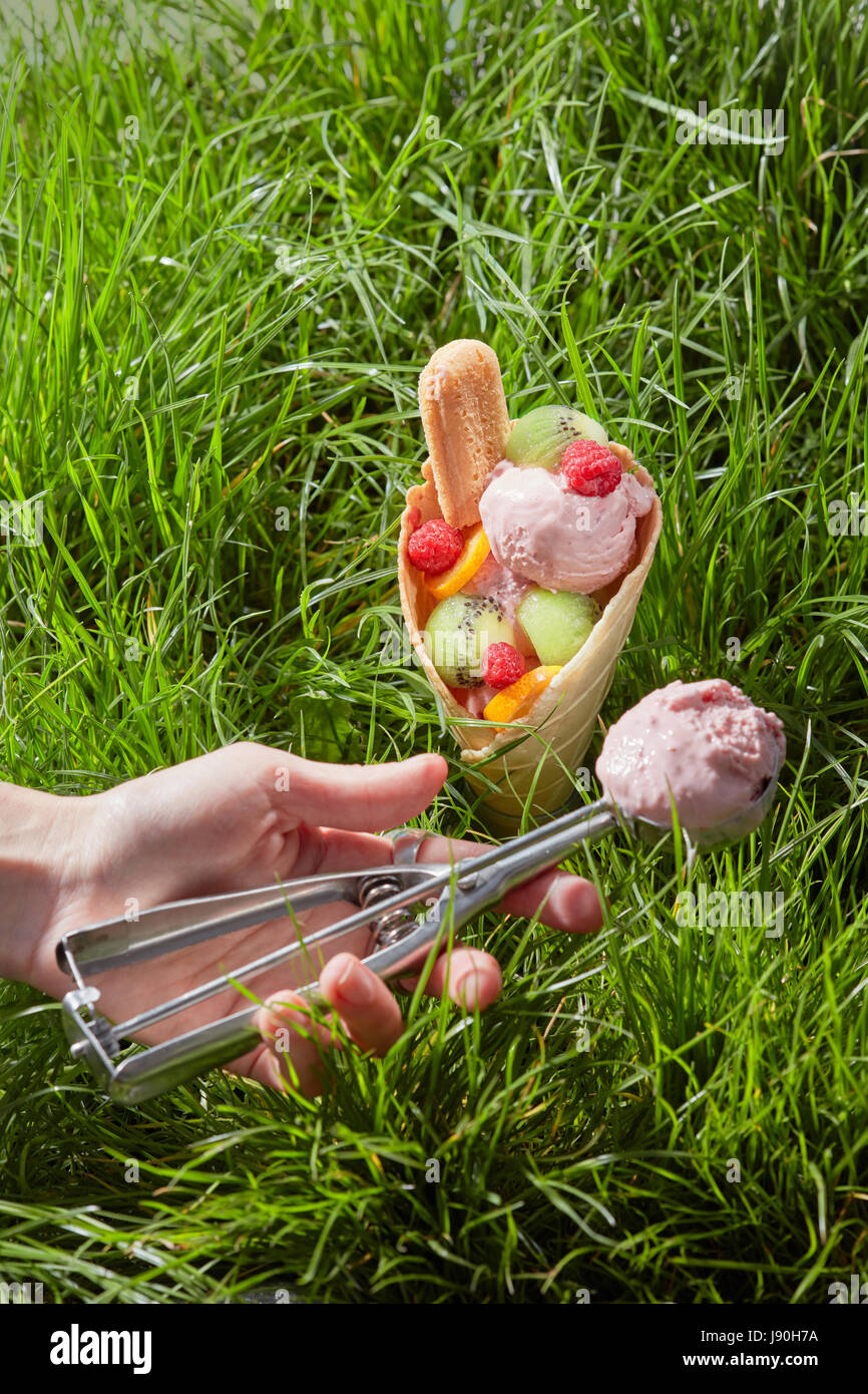 Fruit ice cream in waffle cone Stock Photo Alamy