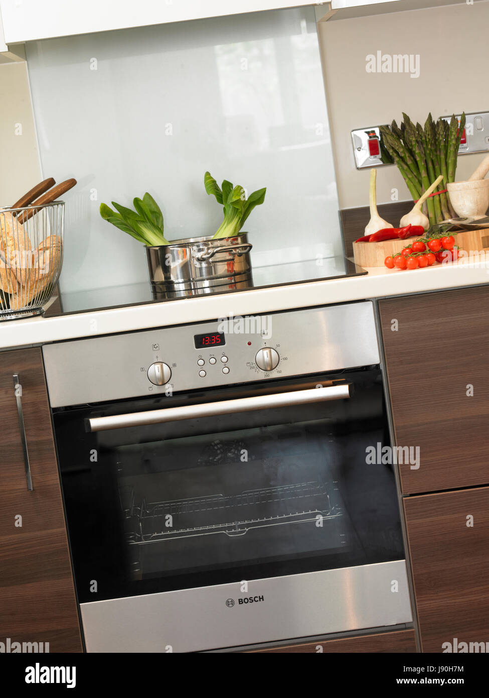 Cooker and oven hob in kitchen Stock Photo Alamy
