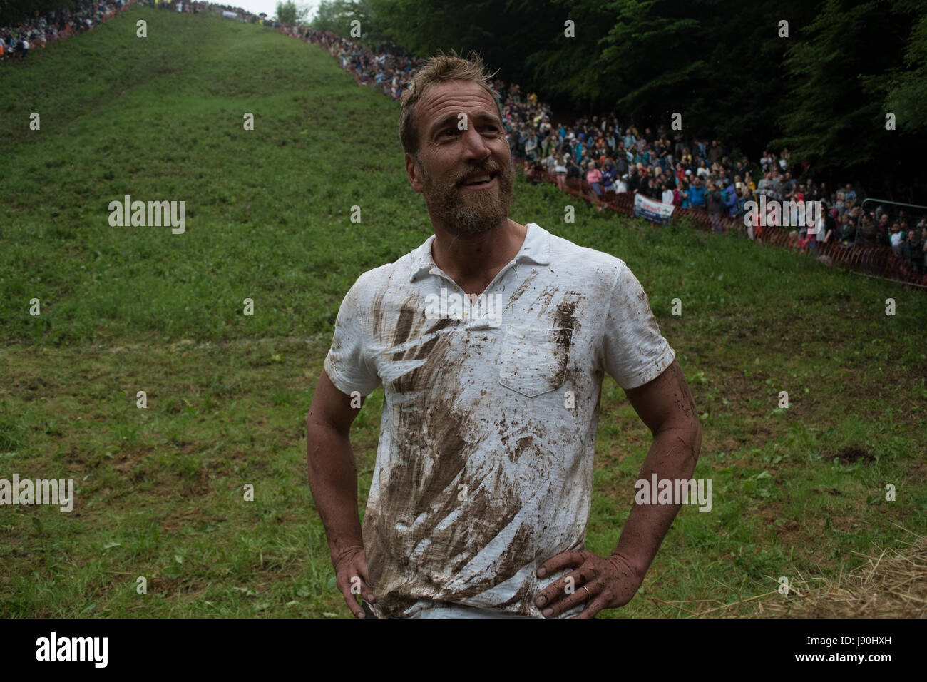Coopers Hill, Gloucestershire, UK. 28th May, 2017. Coopers Hill Gloucestershire. Annual Cheese Rolling Festival. Author & broadcaster Ben Fogle flew in from Canada to compete and he successfully completed the run. Credit: charlie bryan/Alamy Live News Stock Photo