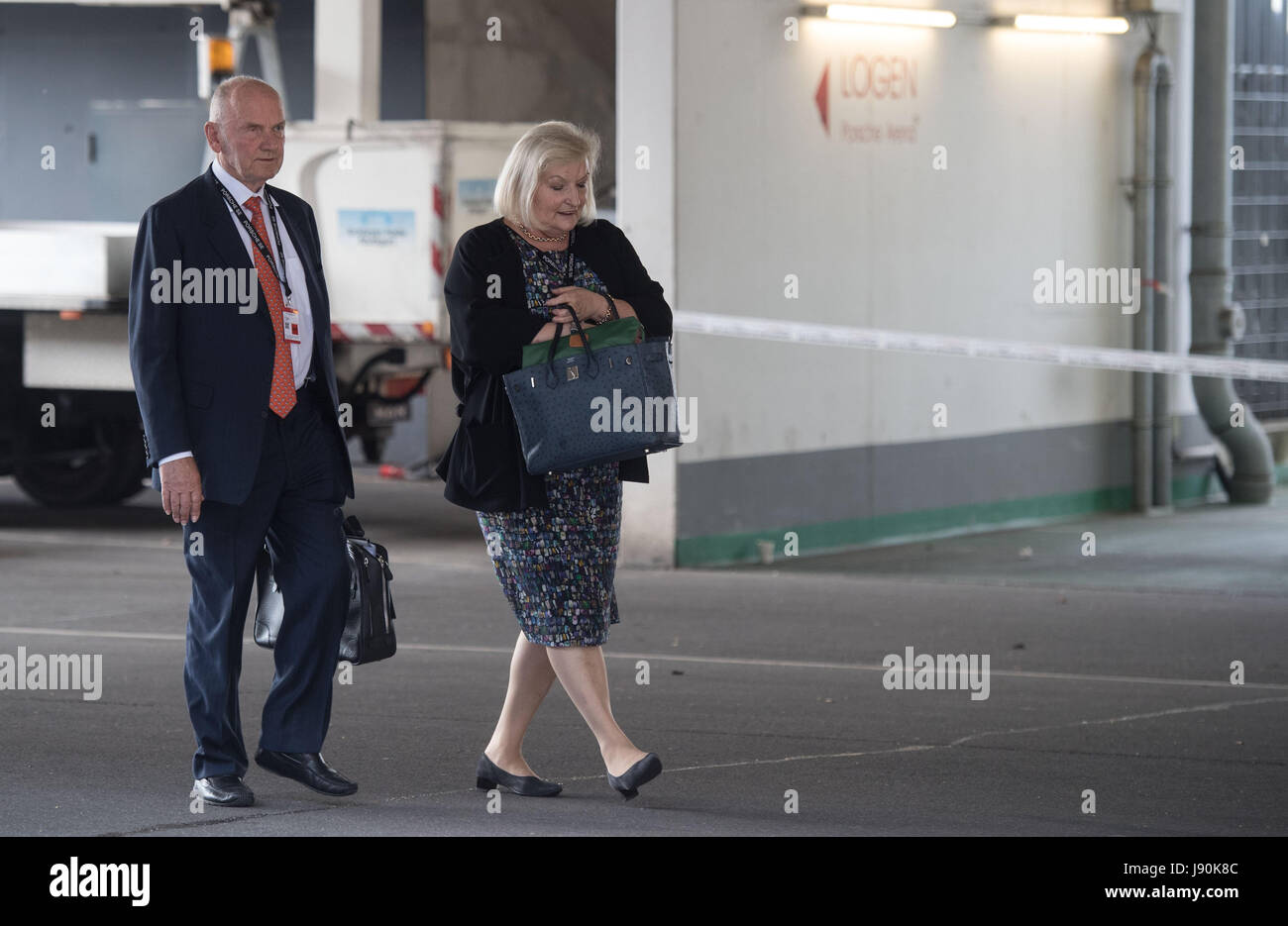 Stuttgart, Germany. 30th May, 2017. Member of the Supervisory Board of Porsche SE, Ferdinand Piech, and his wife Ursula walk into a parking lot after the company's general annual meeting in Stuttgart, Germany, 30 May 2017. Photo: Marijan Murat/dpa/Alamy Live News Stock Photo