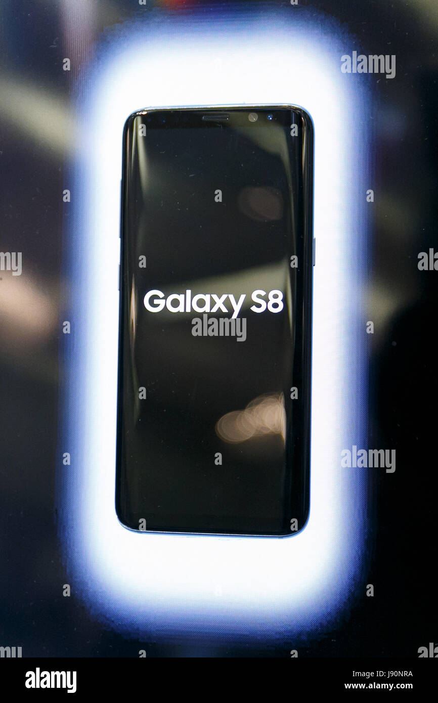 A sample of the AU smartphone Galaxy S8 on display during the 