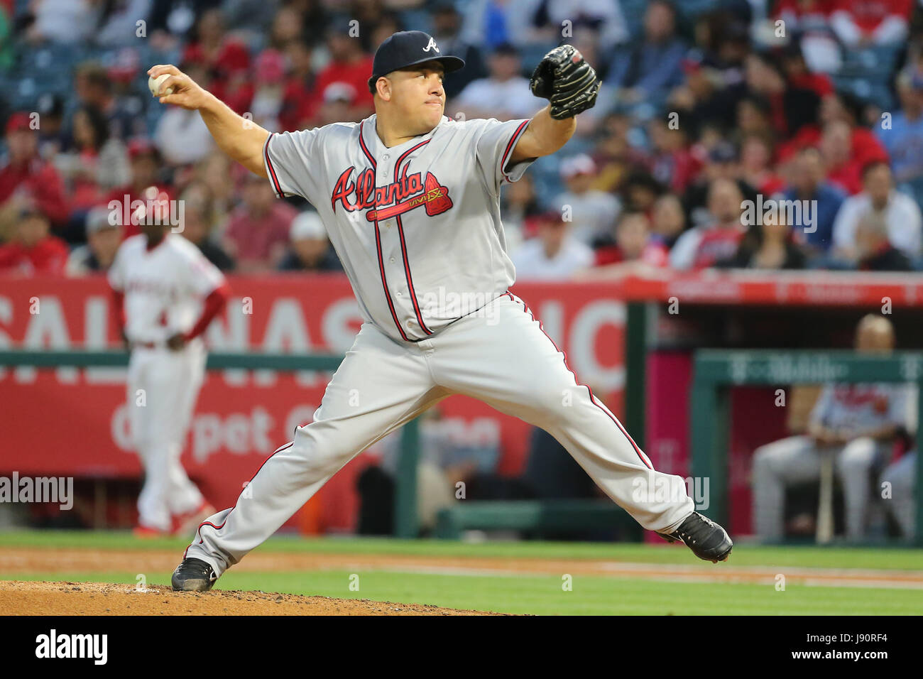 Boston Red Sox starter Bartolo Colon flips the ball after Seattle