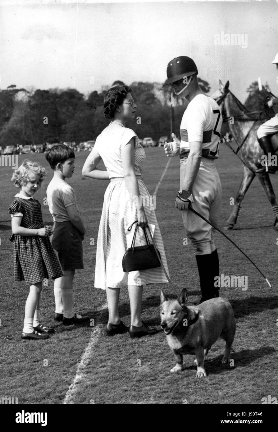 May 05, 1956 - The Duke of Edinburgh plays Polo at Windsor... The Queen and Royal Children attend.: The Duke of Edinburgh played polo on Smith's lawn in Windsor Great Park this afternoon. The Queen  the two Royal children watched the games. Photo shows the Queen goes over to chat to the Duke between chukkers accompanied by Prince Charles and Princess Anne. (Credit Image: © Keystone Press Agency/Keystone USA via ZUMAPRESS.com) Stock Photo