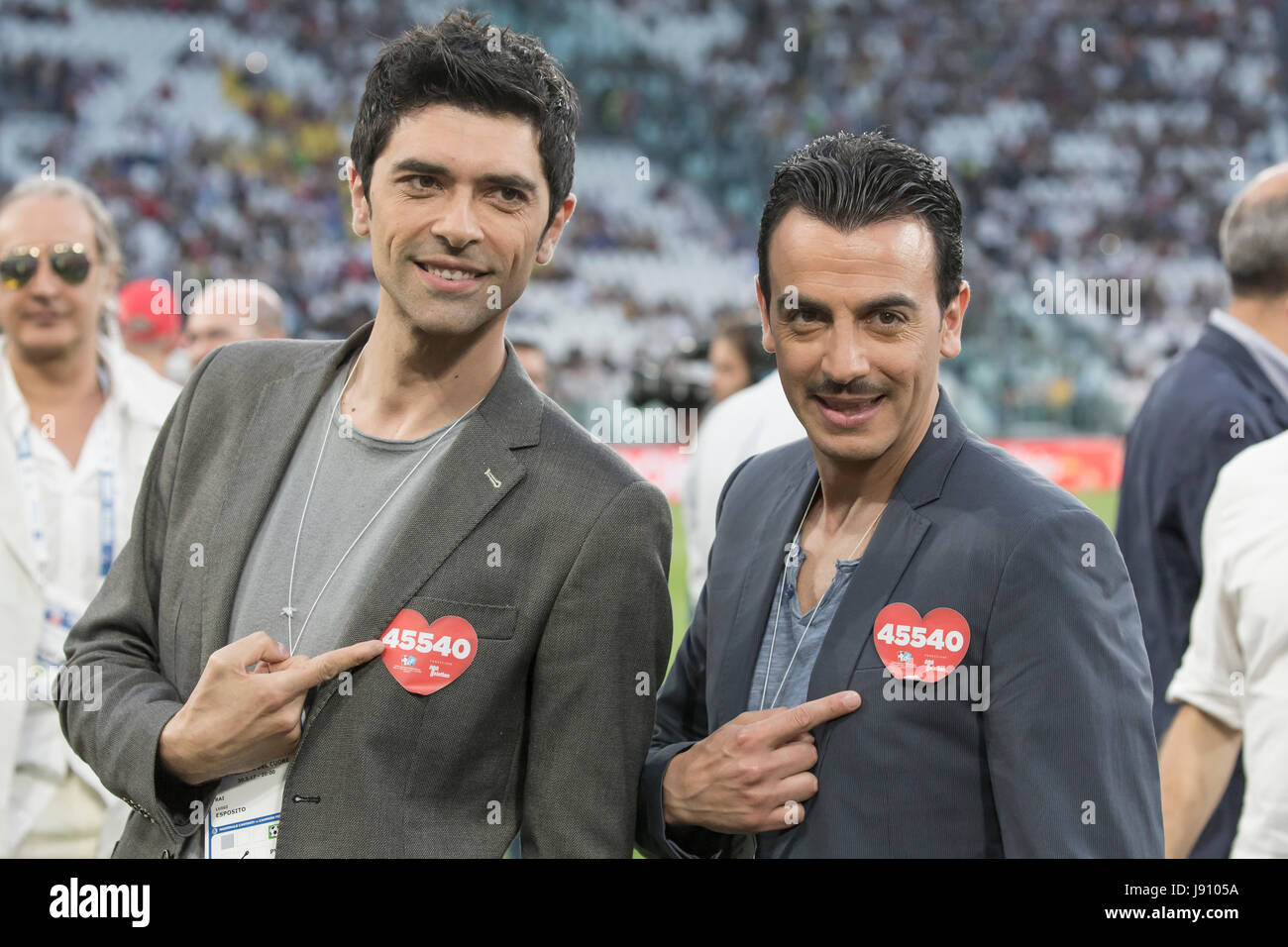 Turin, Italy. 30th May, 2017.   Football charity match. La Partita del Cuore 2017. Singers national football team vs.Champions of the research football team. Gigi and Ross comedians playng as reporters from the field of the event Credit: RENATO VALTERZA/Alamy Live News Stock Photo