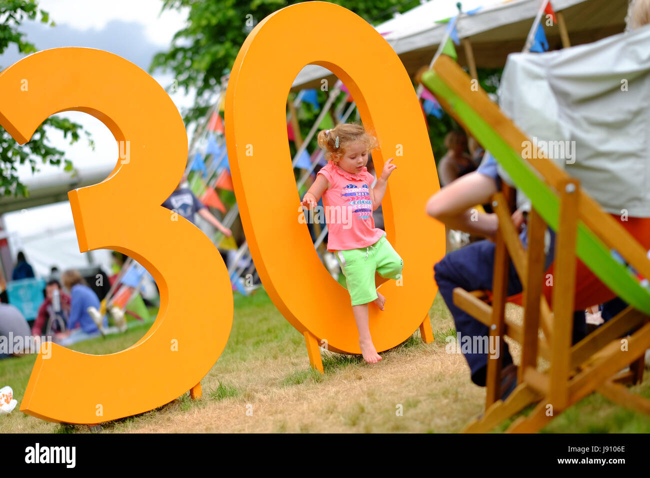 Hay Festival 2017 - Hay on Wye, Wales, UK - May 2017 - Half Term Hay - Children play on the giant iconic HAY 30 letters on the Festival lawns - the Hay Festival celebrates its 30th anniversary in 2017 - . Credit: Steven May/Alamy Live News Stock Photo