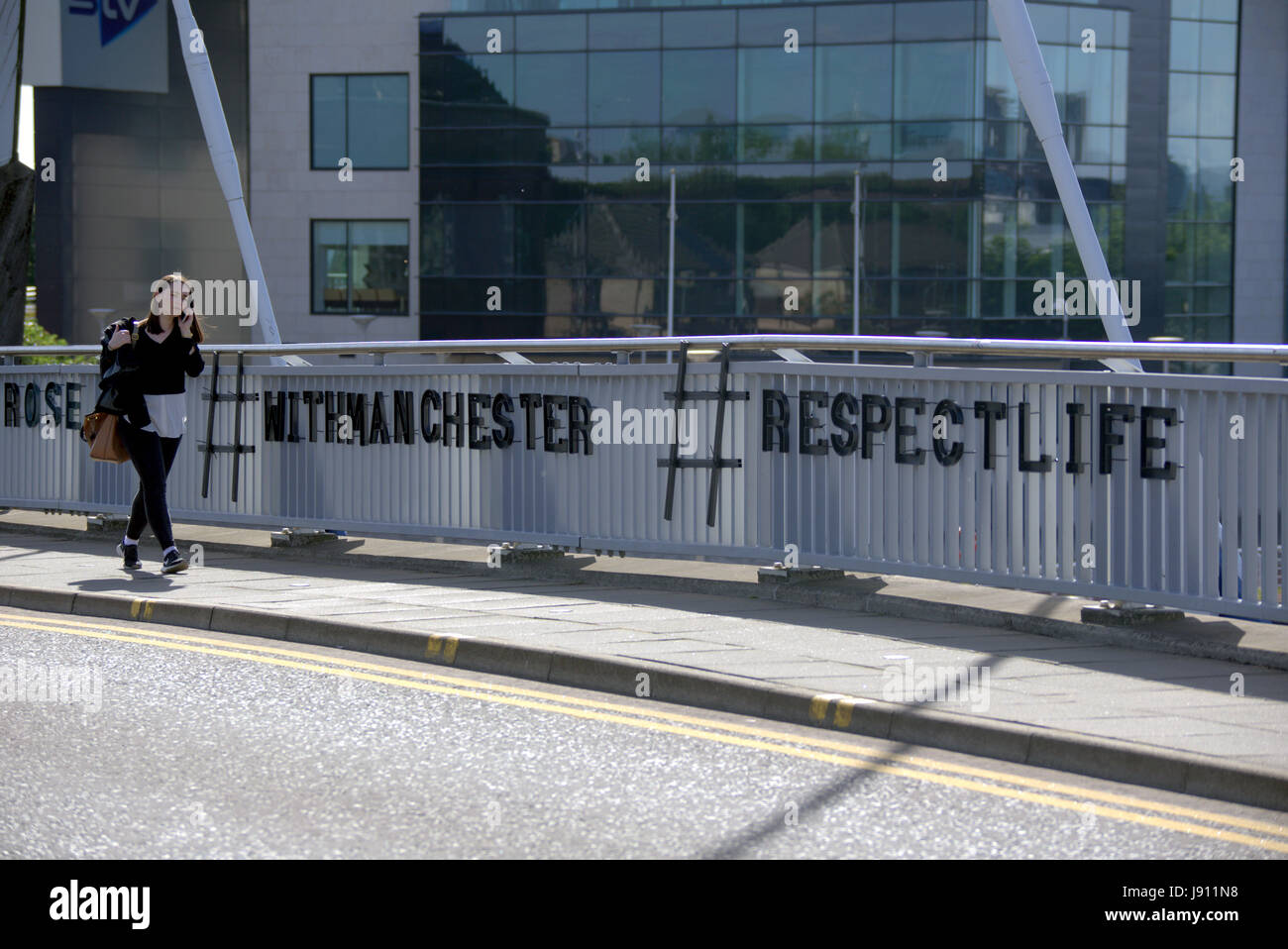 Glasgow, Scotland, UK 31st May,Tribute to Manchester bombing victims appears on Clyde Bridge. The Squinty  Bridge at the Pacific Quay home of the Scottish media community was covered in the names  of all of the Manchester bombing victims overnight by a mystery artist. Gerard Ferry/Alamy Live News Stock Photo