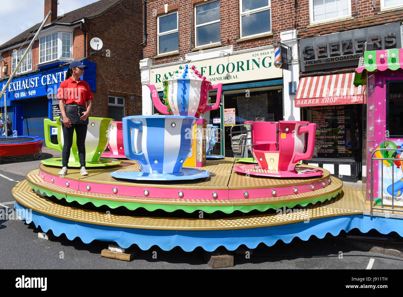 Spinning tea cup ride hires stock photography and images Alamy