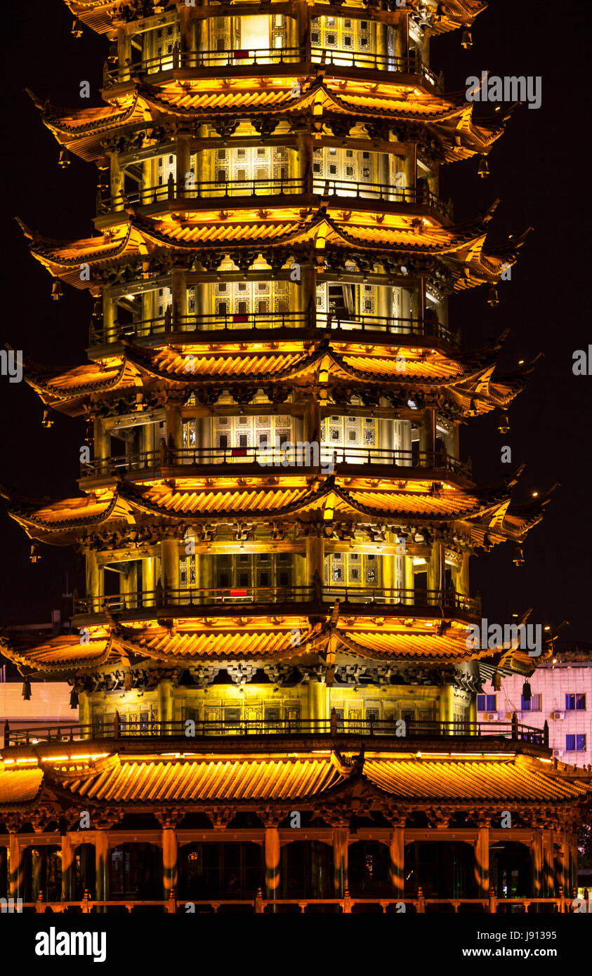 Guilin, China.  Sun Pagoda beside Shan Lake, at Night. Stock Photo