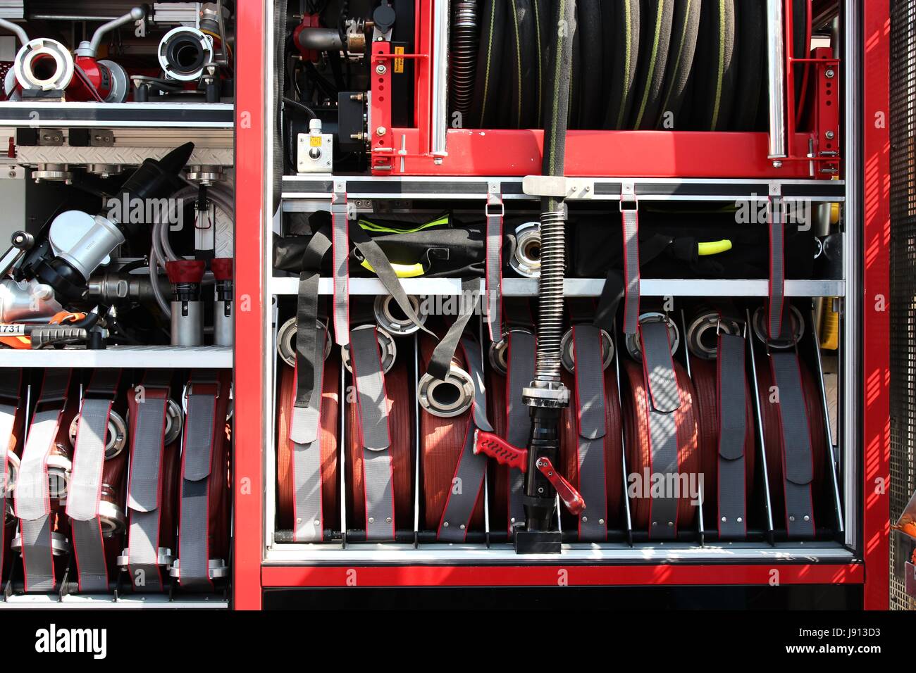fire hoses on board a fire engine Stock Photo