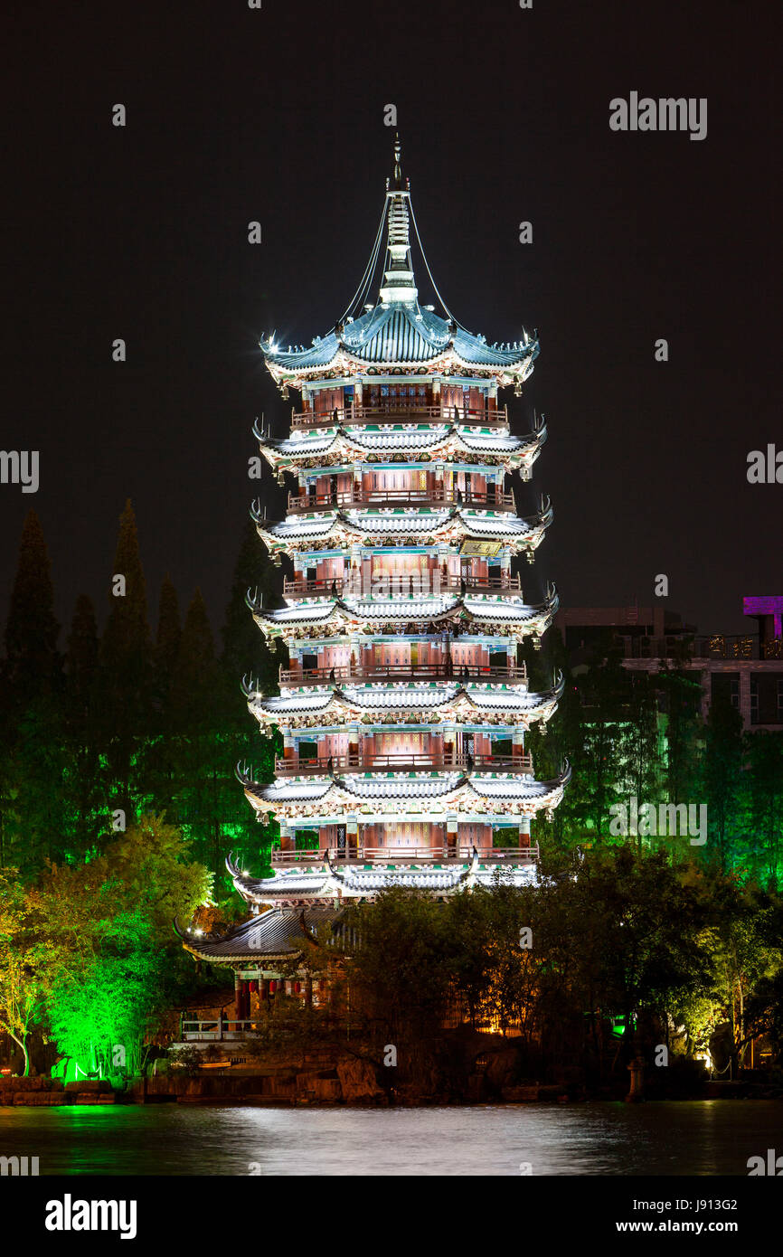 Guilin, China.  Moon Pagoda beside Shan Lake at Night. Stock Photo