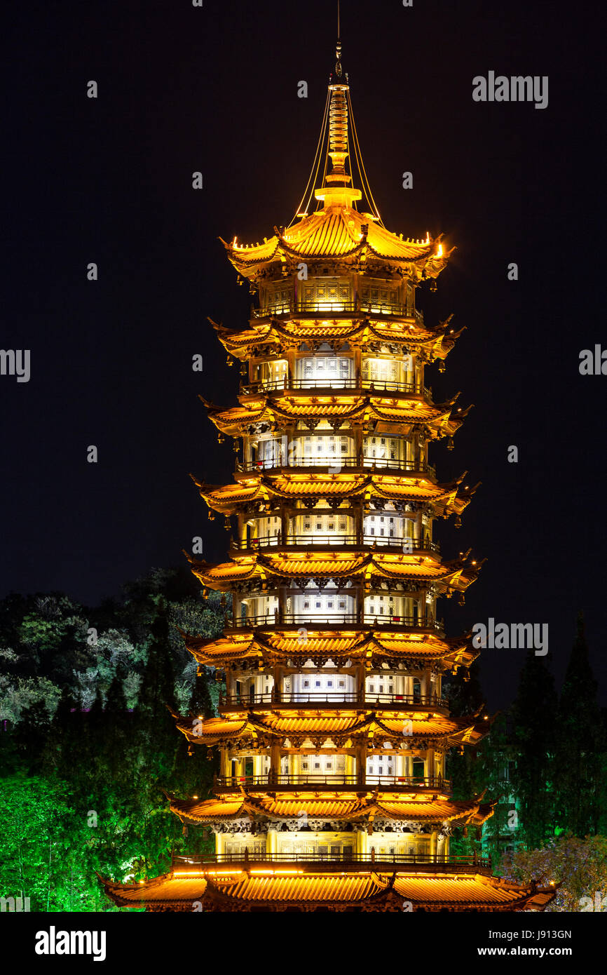 Guilin, China.  Sun  Pagoda beside Shan Lake at Night. Stock Photo