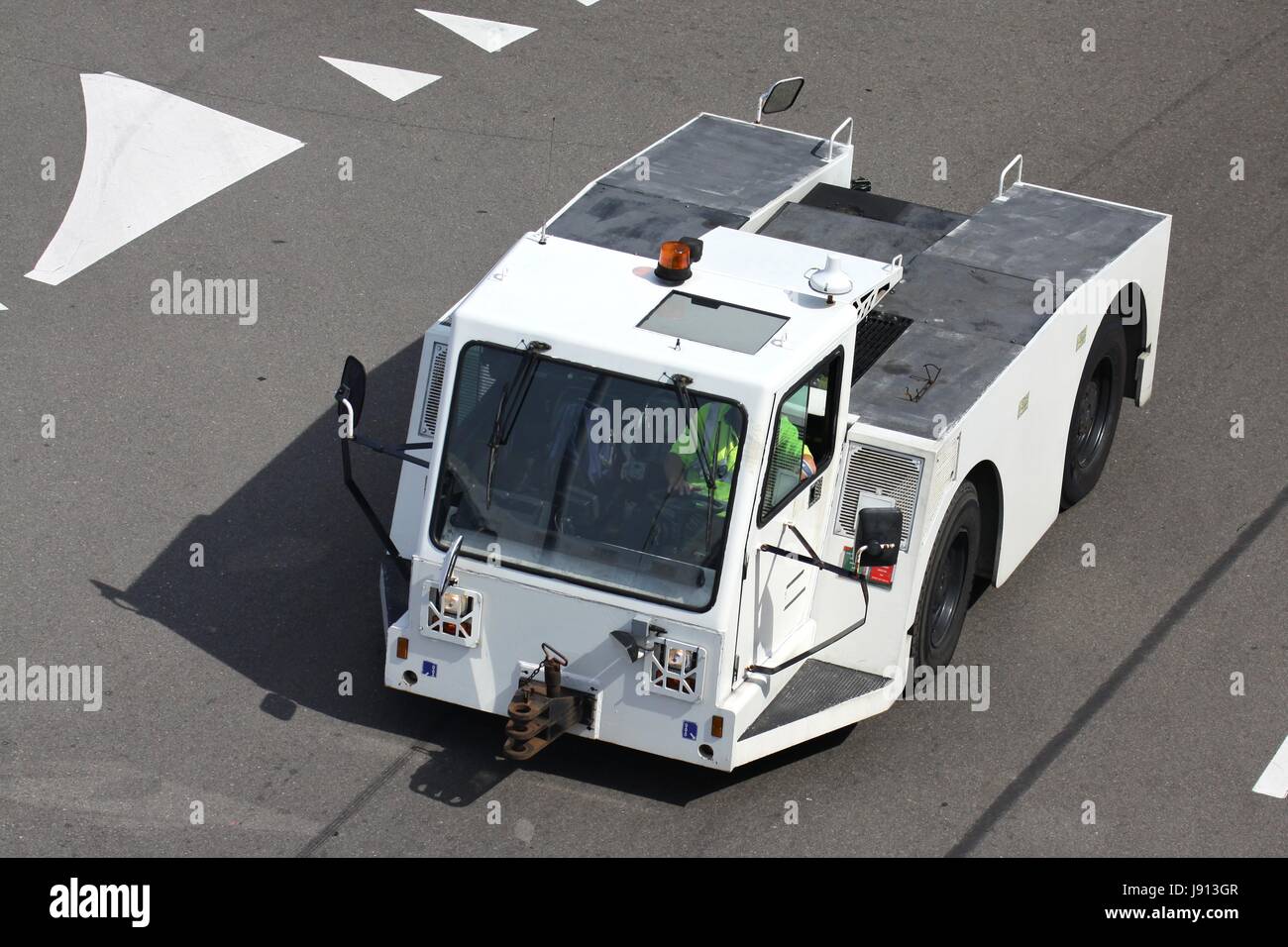 conventional pushback tug at airport Stock Photo