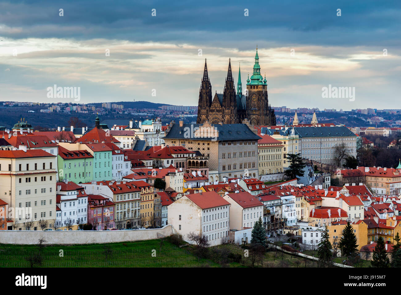 View of Prague and Prague castle from Petrin hill at sunset with dramatic sky. Czechia Stock Photo