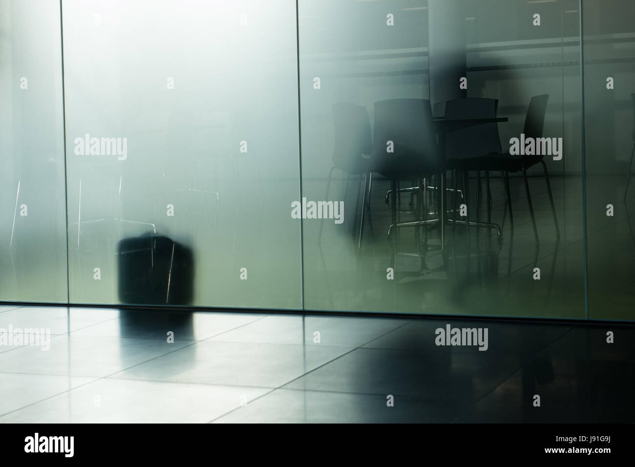 office meeting space behind glass wall Stock Photo - Alamy