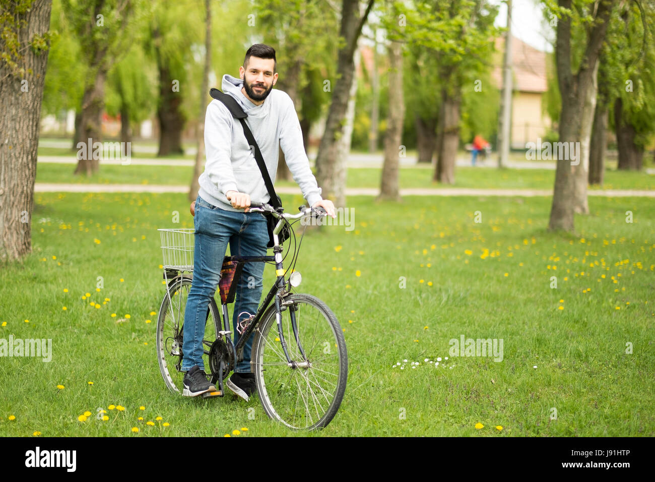 Handsome student man with retro bike Stock Photo