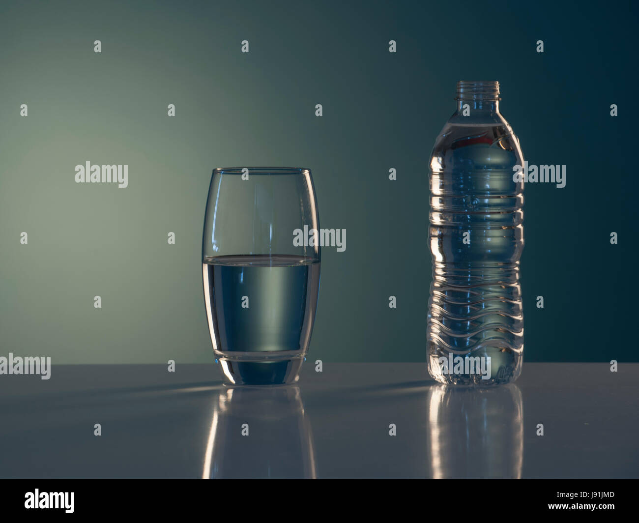 water in glass and plastic bottle Stock Photo Alamy