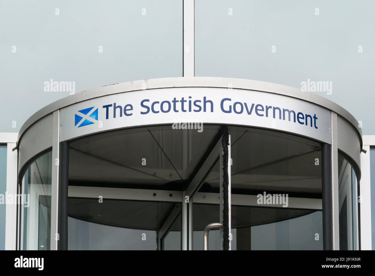 The Scottish Government sign above revolving door at officers in Atlantic Quay, Glasgow Stock Photo