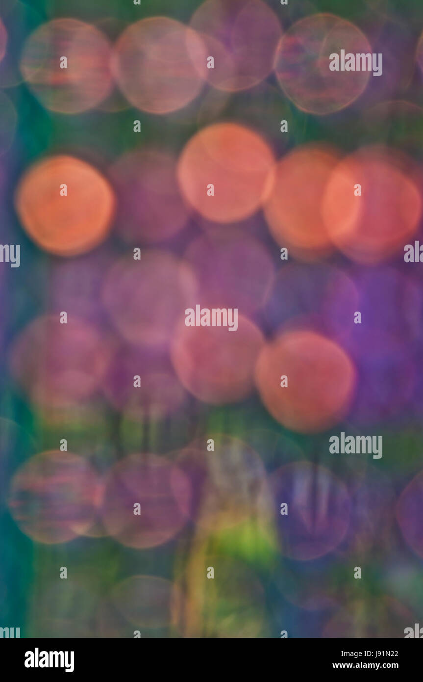 background of orbs in orange and green Stock Photo