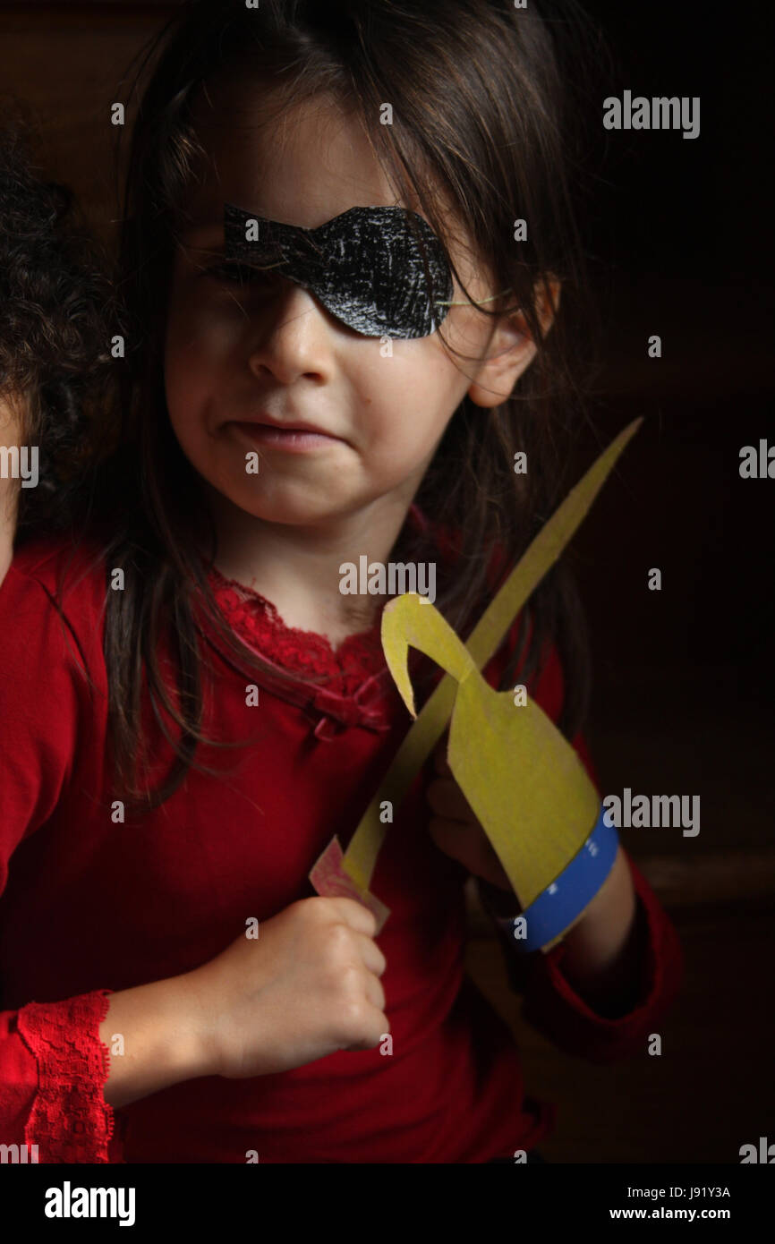 Little Girl Playing Pirate With Self Made Accessories Stock Photo