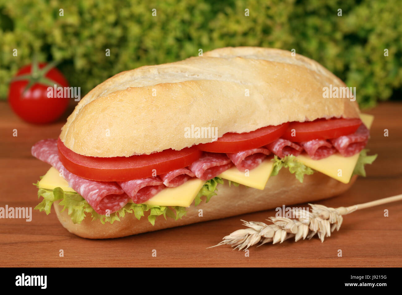 baguette topped with salami Stock Photo Alamy
