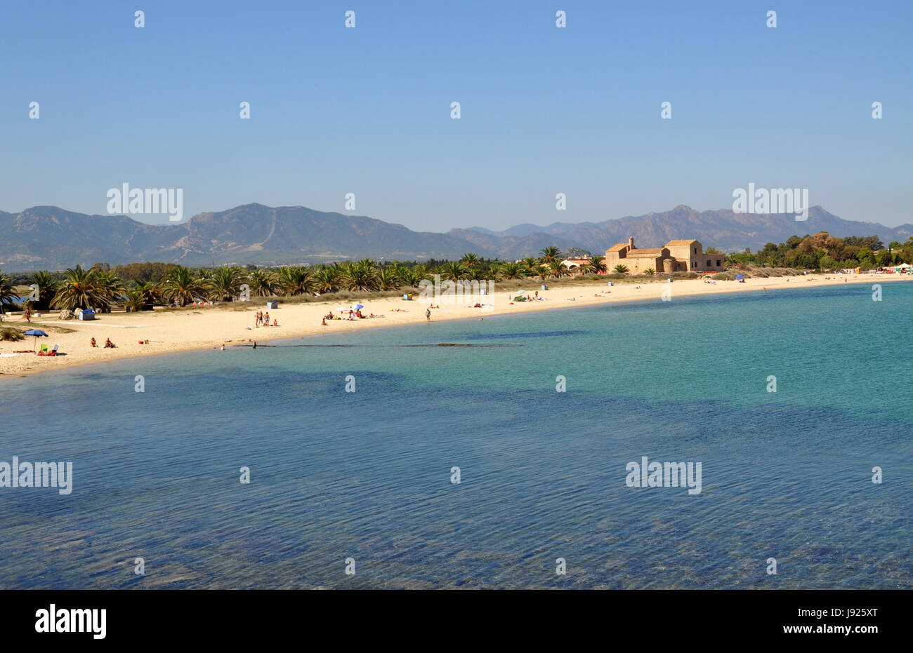 Beeautiful Nora beach and old cathedral view on Sardinia island in Italy - Mediterranean sea Stock Photo