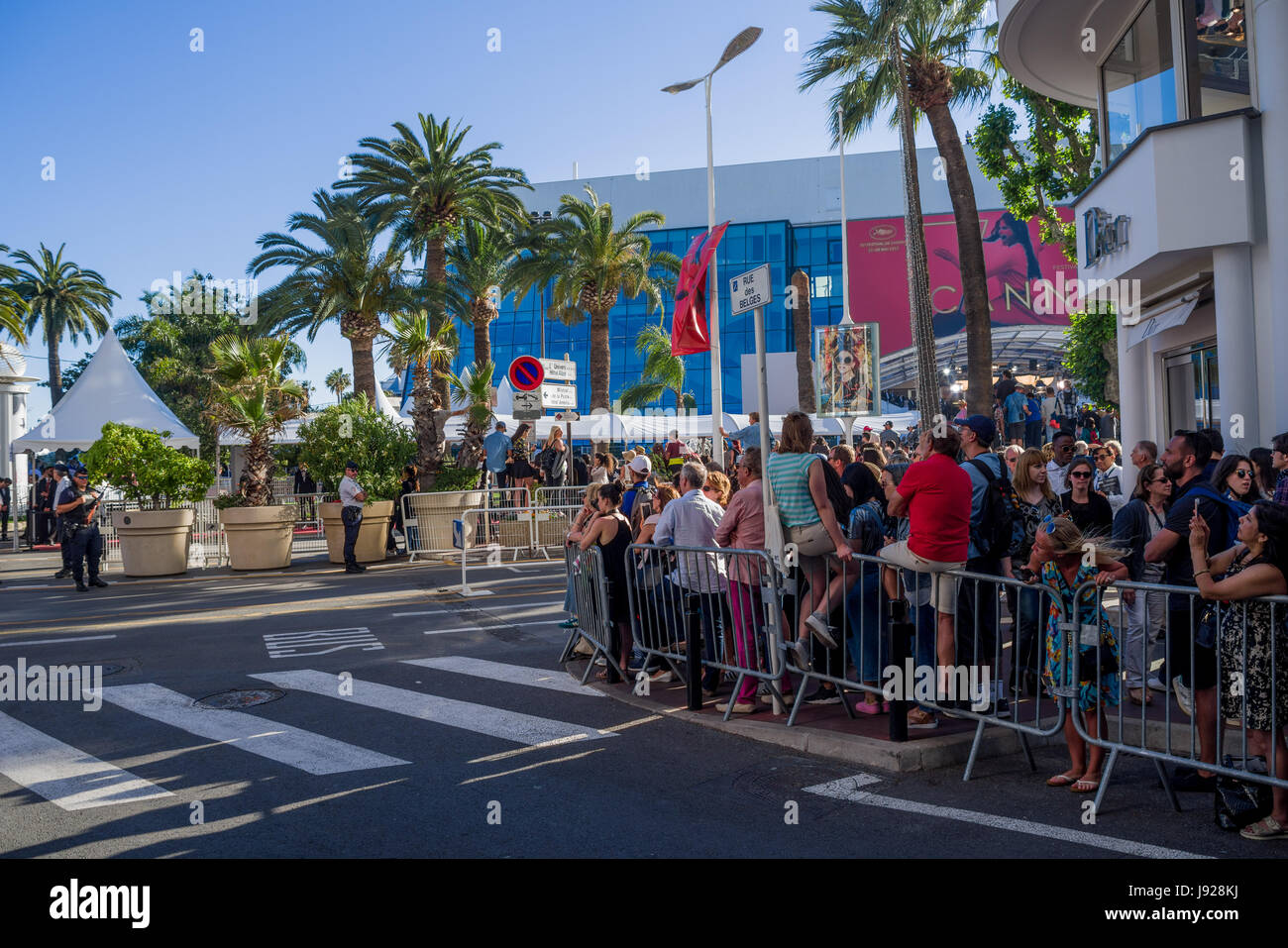 CANNES,FRANCE - MAY.19: people waits outside the red carpet at the cinema of cannes the arrival of the crew of the film screened today in the third da Stock Photo