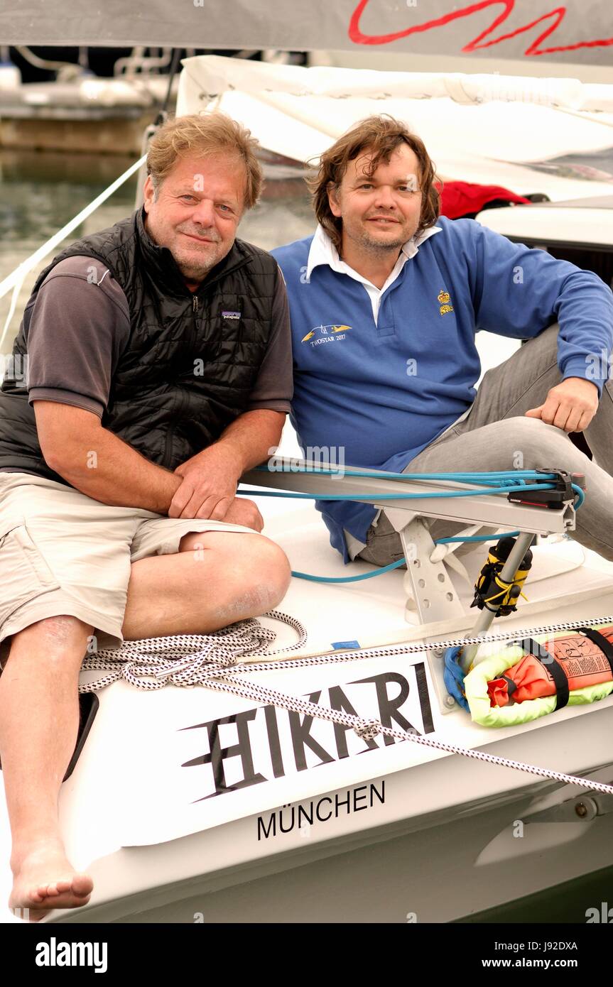 AJAXNETPHOTO. 28TH MAY, 2017. PLYMOUTH, ENGLAND. - TRANSAT - TWO STAR - (L-R) WERNER STOLZ AND BERK PLATHNER (GER) CO-SKIPPERS OF THE TRIMARAN HIKARI ONBOARD THEIR RACE BOAT IN QUEEN ANNE'S BATTERY MARINA BEFORE THE START. BOTH SAILORS ARE FROM MUNICH (MUNCHEN). PHOTO:JONATHAN EASTLAND/AJAX REF:D172905 6497 Stock Photo