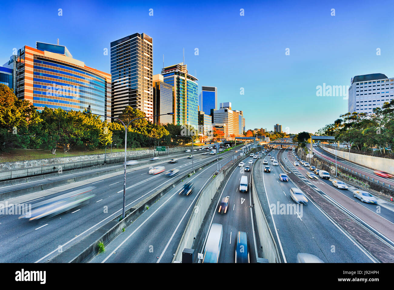 Wide view of multi lane Warringah freeway going through North SYdney during morning rush hour traffic peak and congestion in Australia. Stock Photo