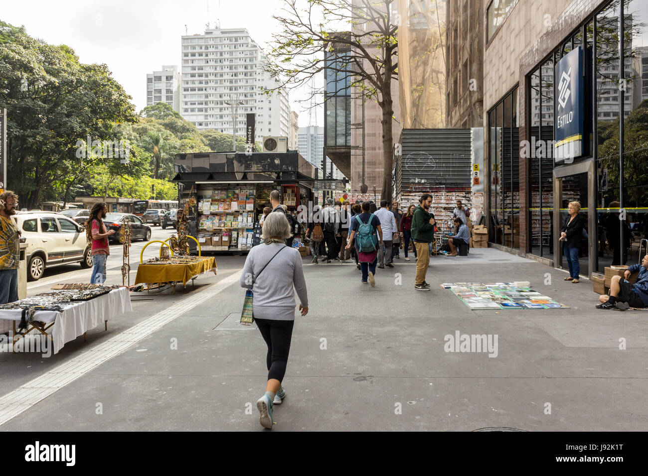 Brazil, Sao Paulo - May 14, 2016: View of Avenida Paulista in the center of Sao Paulo city with its commercial buildings and cars passing by Stock Photo