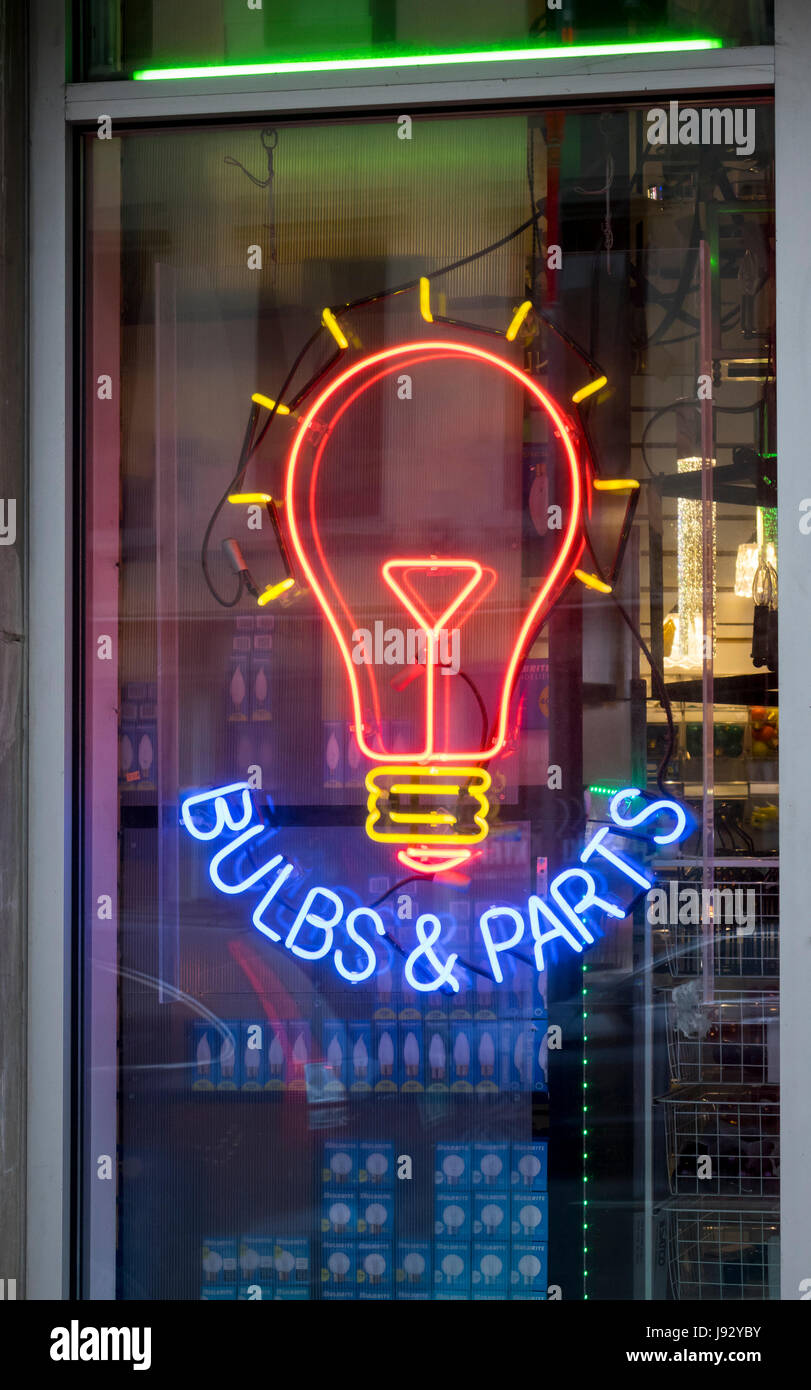 Neon window display for a store selling bulbs and lighting fixtures on the Lower Eastside in New York City Stock Photo