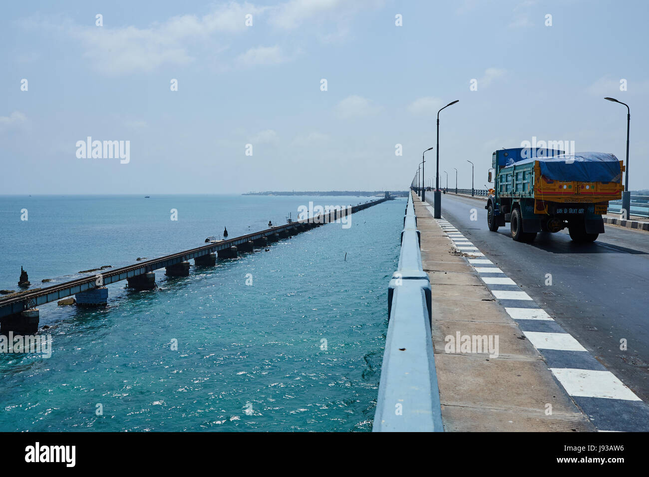 Pamban Bridge.India's first sea bridge across sea.Its a cantilever bridge.It opens up at center to make way for ships. Stock Photo