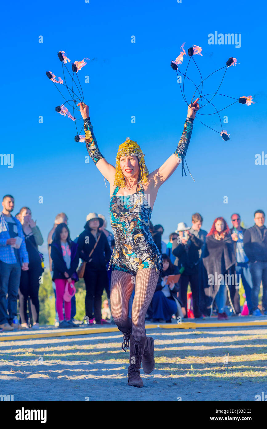 Fire Dancer performance art, Garry Point Park,  Richmond, British Columbia, Canada. Stock Photo