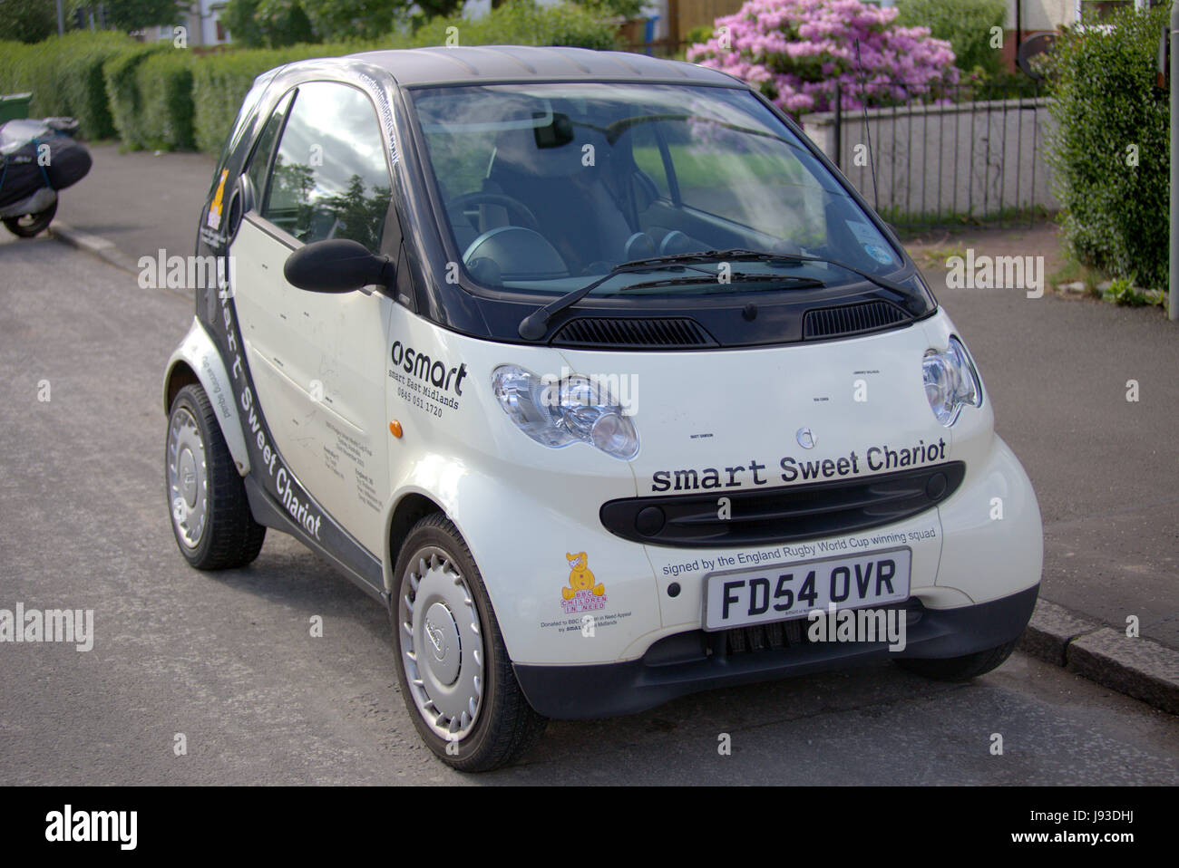 smart sweet chariot smart car from children in need with the England cricket team signatures Stock Photo