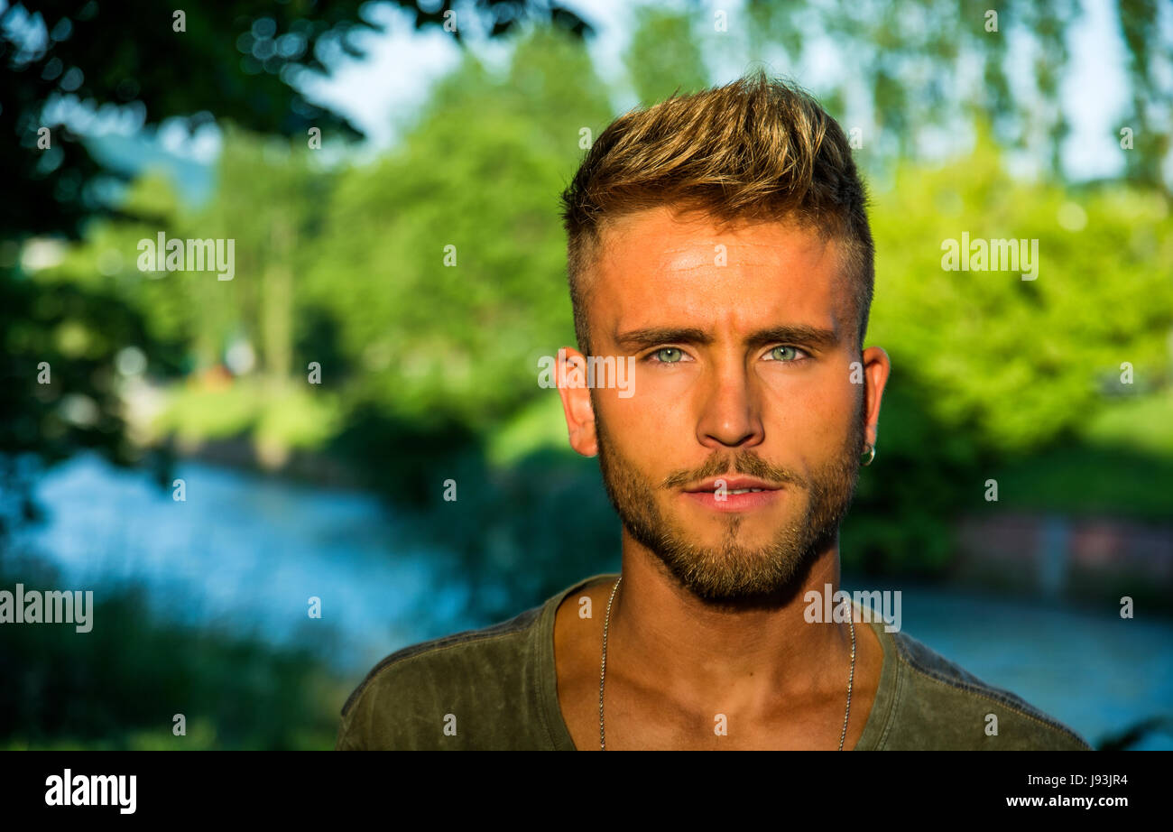 Blond hair blue eyed young man hi-res stock photography and images - Alamy