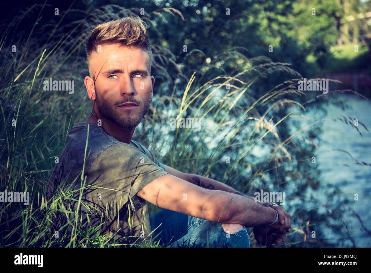 Blond hair blue eyed young man hi-res stock photography and images - Alamy