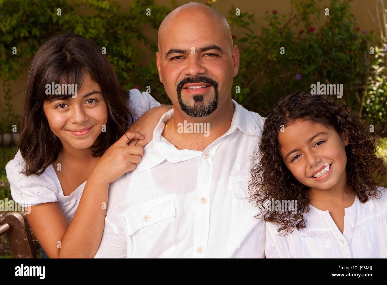 Happy Hispanic family laughing and smiling Stock Photo - Alamy