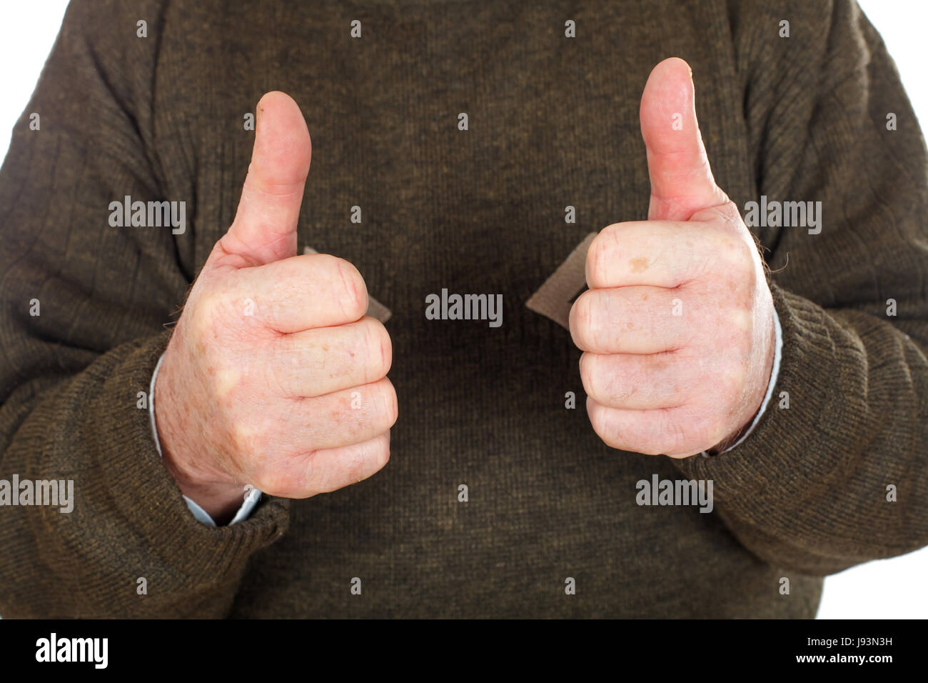 Close up picture of an elderly man showing thumbs up Stock Photo - Alamy